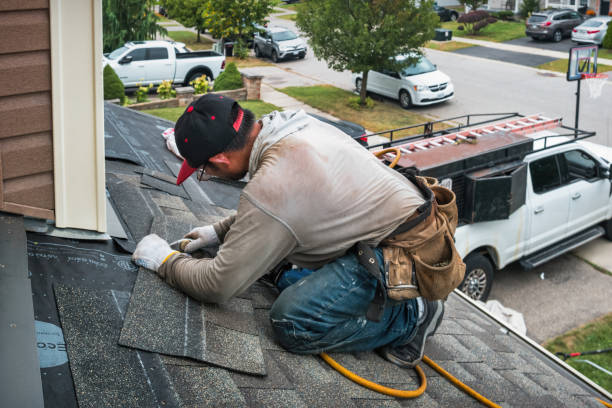 Professional Roofing technician working in Tensed, ID
